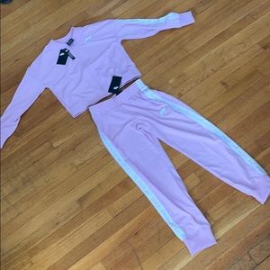 Nike suit light pink/purple